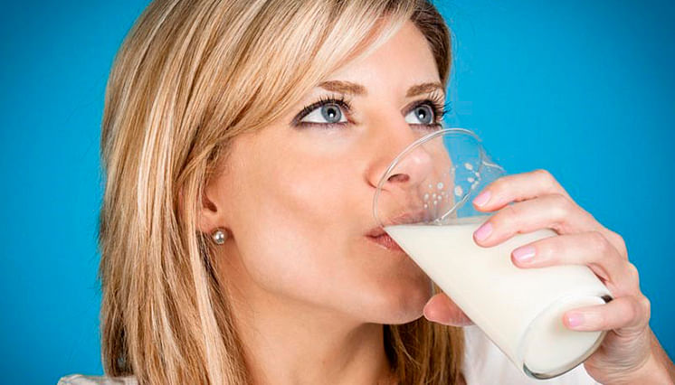 woman drinking milk